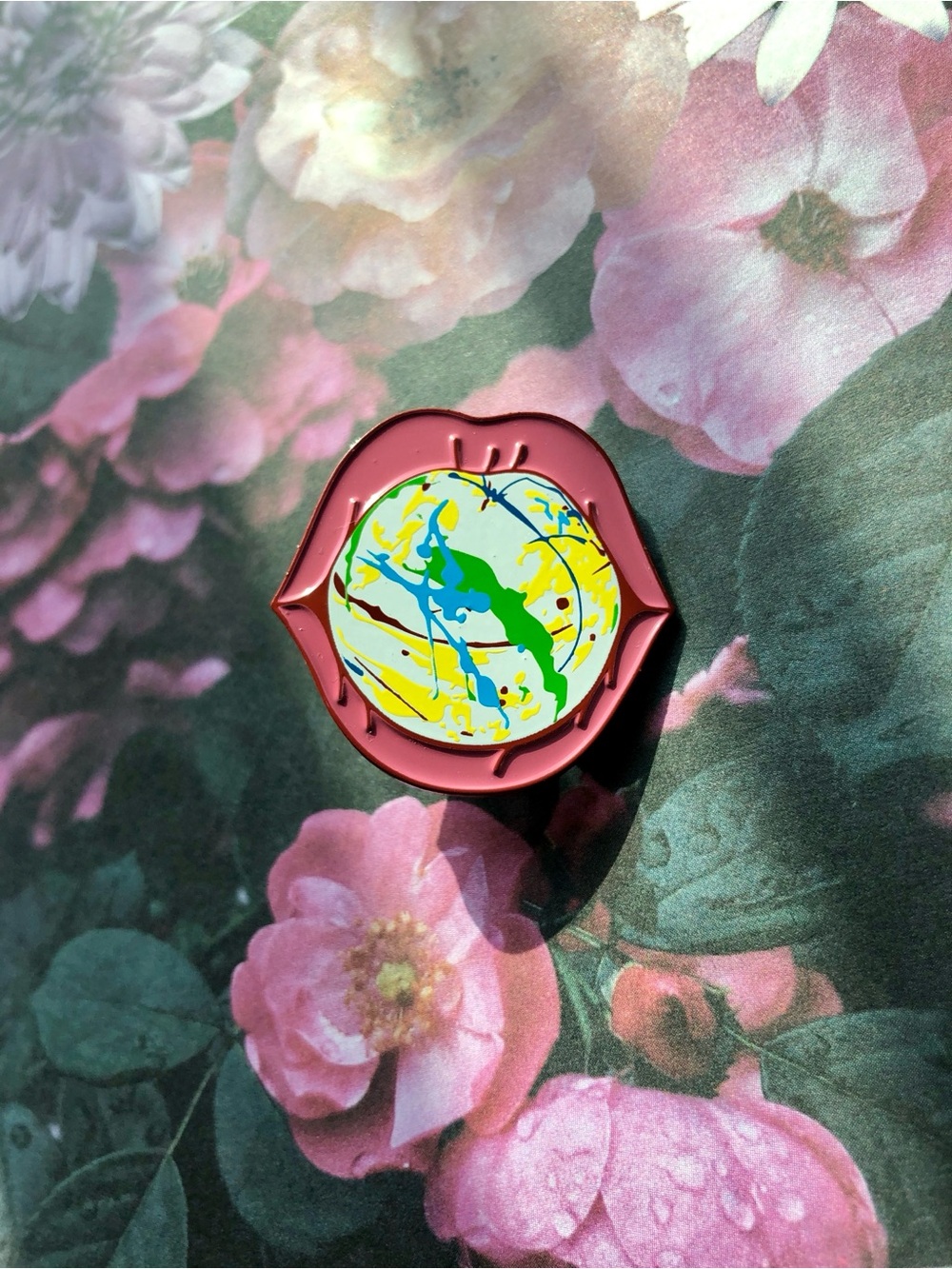 Pink Lip-Shaped Enamel Pin with Jawbreaker in Center